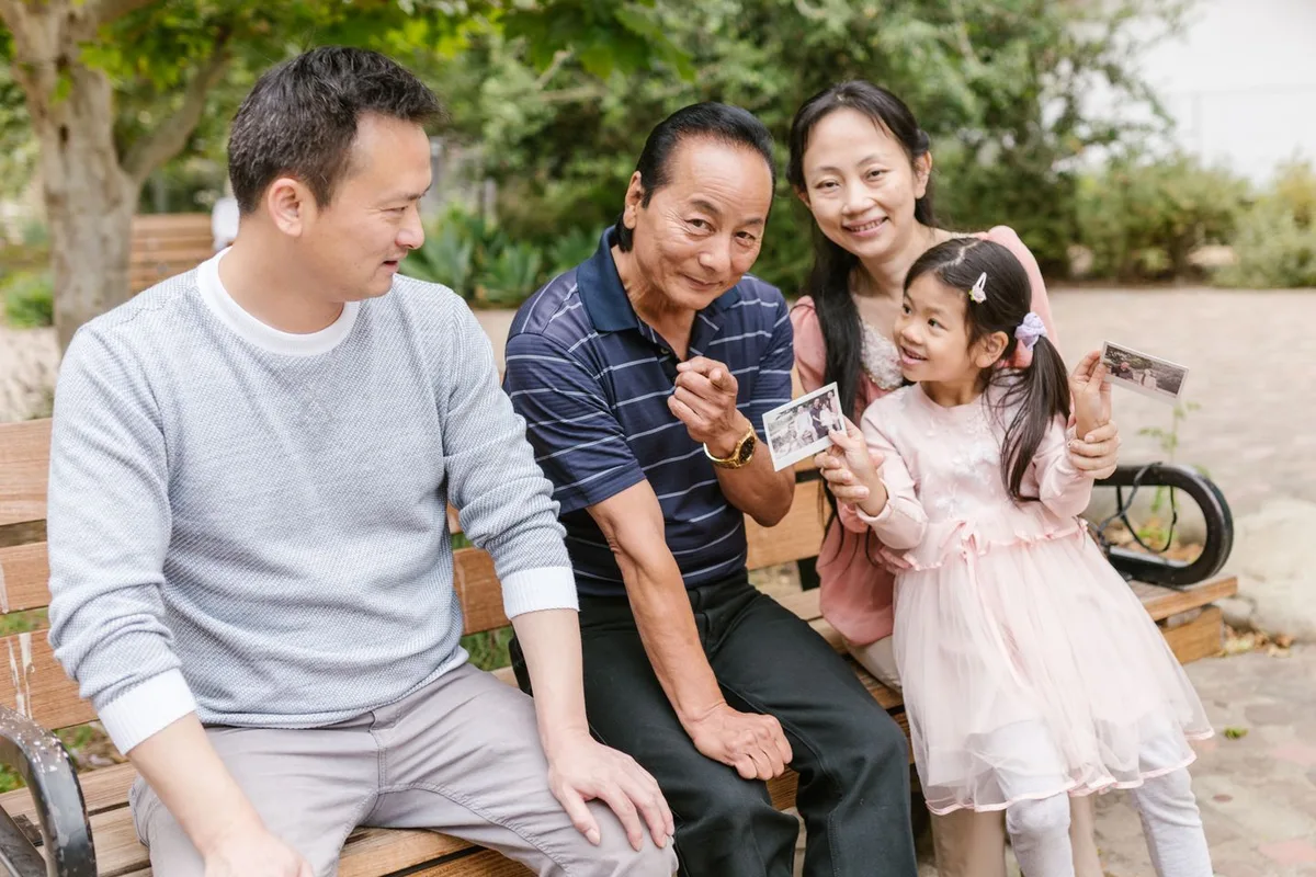 Three generations of a family spending time together outdoors
